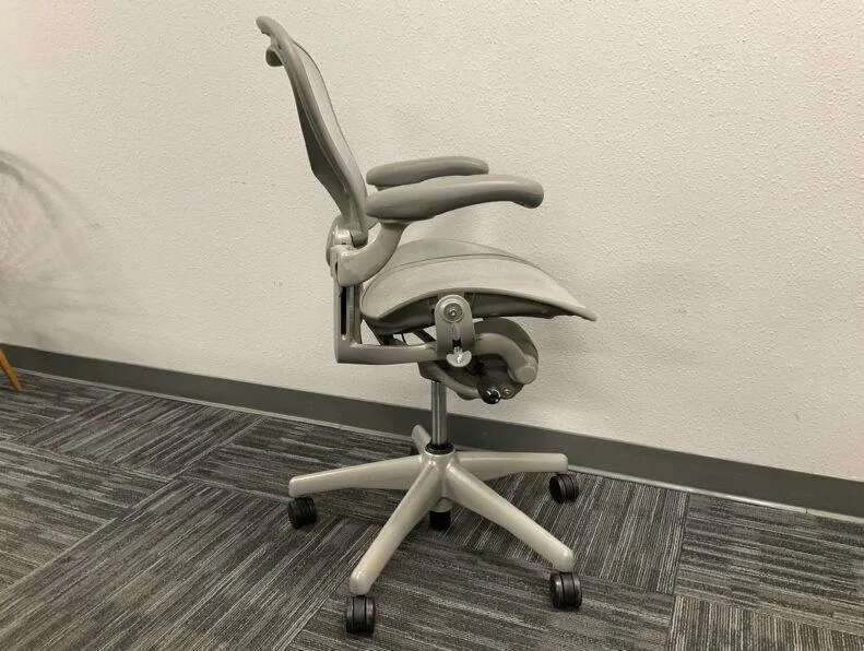 Used Herman Miller Aeron chair, opposite side view with adjustable arms