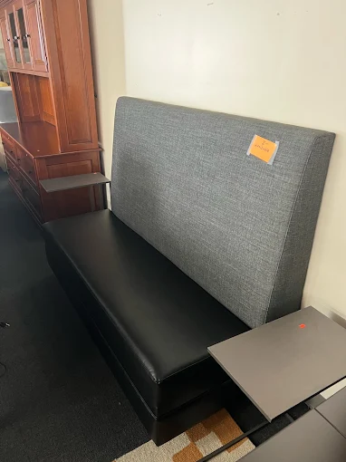 Upholstered banquette booth seating at BT Express Liquidators, San Jose