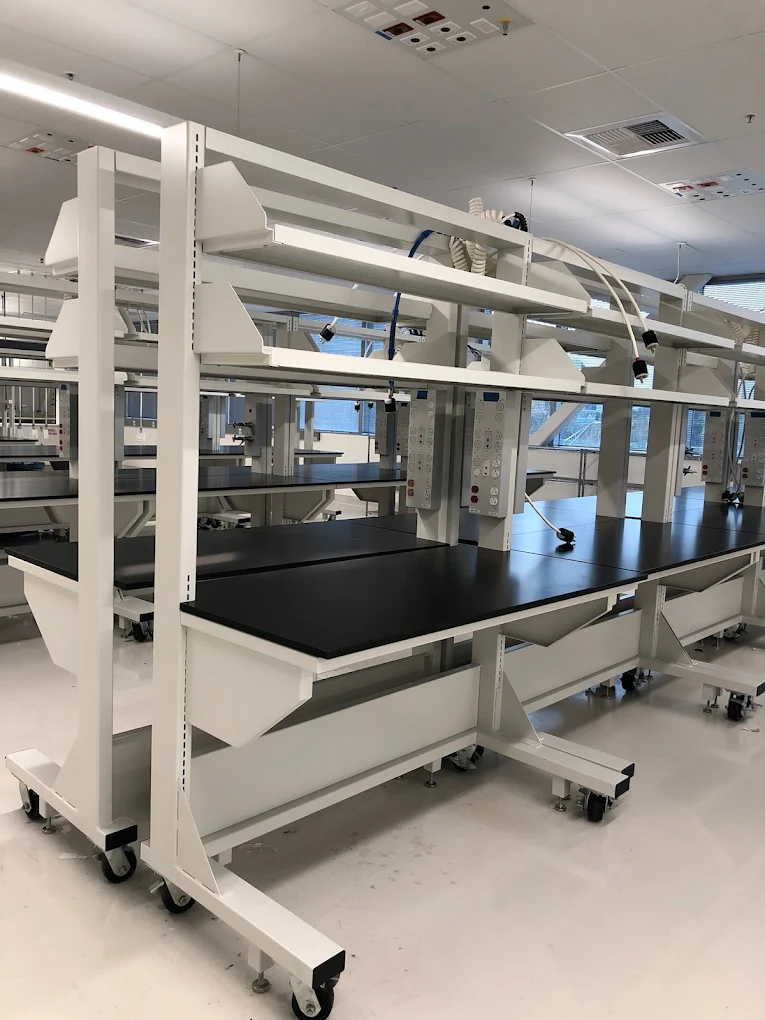 Lab benches with chemical-resistant epoxy tops in the BT Express Liquidators showroom, San Jose