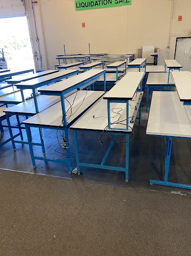 Work tables with laminate tops at BT Express Liquidators, San Jose