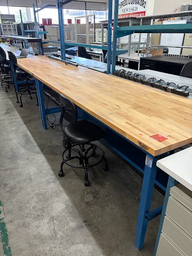 Butcher-block work bench with steel frame at BT Express Liquidators, San Jose